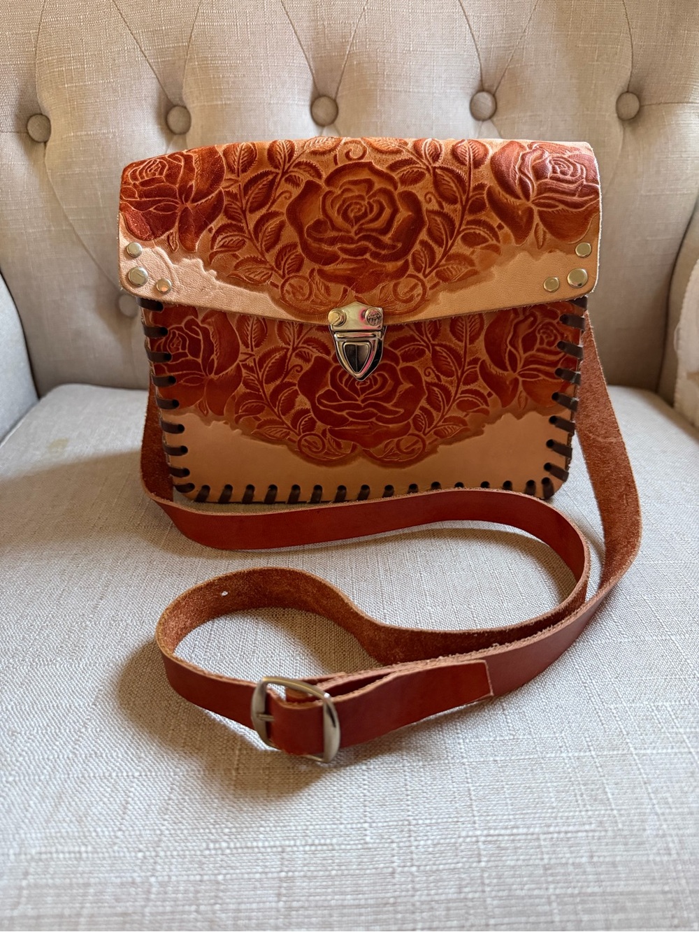 Tooled Floral Leather Crossbody Bag in Rust Brown